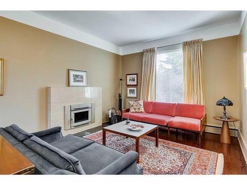 1911 11 Street Sw, Calgary, AB - Indoor Photo Showing Living Room With Fireplace