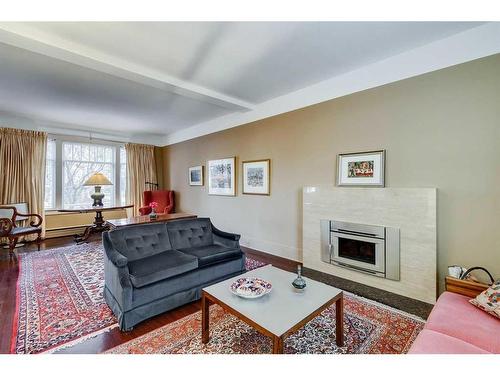 1911 11 Street Sw, Calgary, AB - Indoor Photo Showing Living Room With Fireplace