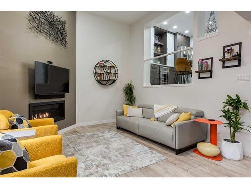 3920 Point Mckay Road Nw, Calgary, AB - Indoor Photo Showing Living Room With Fireplace