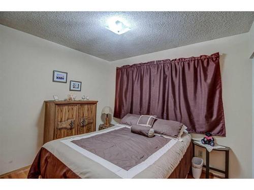 9131 Academy Drive Se, Calgary, AB - Indoor Photo Showing Bedroom