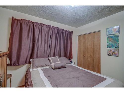 9131 Academy Drive Se, Calgary, AB - Indoor Photo Showing Bedroom