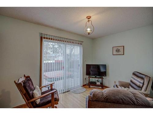 9131 Academy Drive Se, Calgary, AB - Indoor Photo Showing Living Room