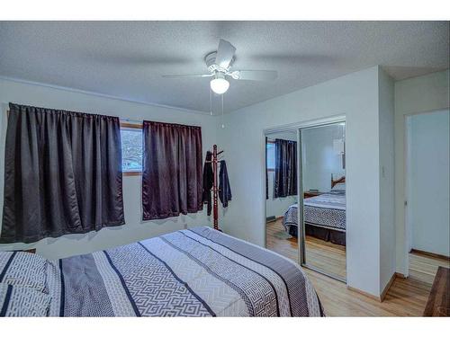 9131 Academy Drive Se, Calgary, AB - Indoor Photo Showing Bedroom