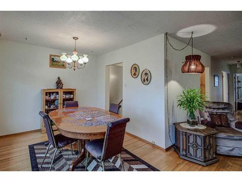 9131 Academy Drive Se, Calgary, AB - Indoor Photo Showing Dining Room