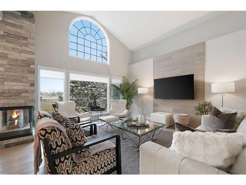 27 Meadow Pointe Drive, Heritage Pointe, AB - Indoor Photo Showing Living Room With Fireplace