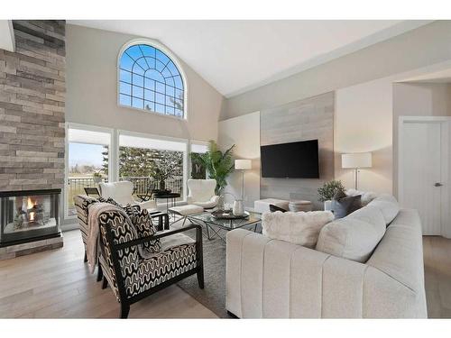 27 Meadow Pointe Drive, Heritage Pointe, AB - Indoor Photo Showing Living Room With Fireplace