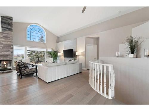 27 Meadow Pointe Drive, Heritage Pointe, AB - Indoor Photo Showing Living Room With Fireplace