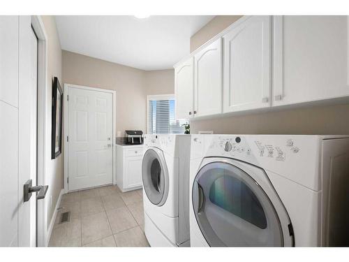 27 Meadow Pointe Drive, Heritage Pointe, AB - Indoor Photo Showing Laundry Room