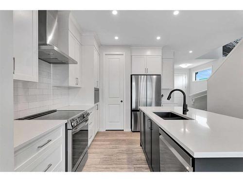 12 Rowley Terrace Nw, Calgary, AB - Indoor Photo Showing Kitchen With Upgraded Kitchen