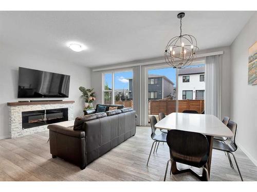 12 Rowley Terrace Nw, Calgary, AB - Indoor With Fireplace