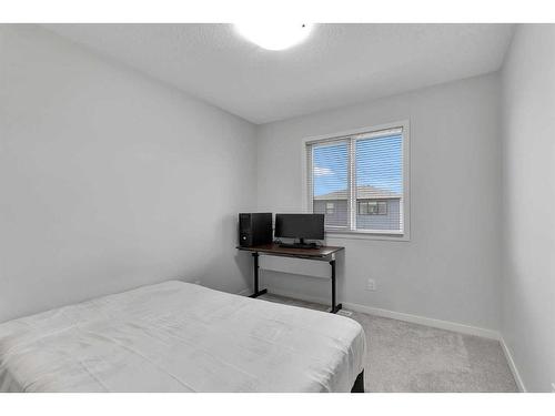 12 Rowley Terrace Nw, Calgary, AB - Indoor Photo Showing Bedroom