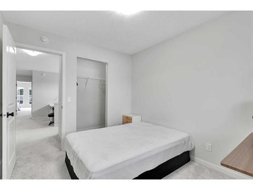 12 Rowley Terrace Nw, Calgary, AB - Indoor Photo Showing Bedroom