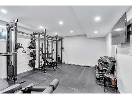 12 Rowley Terrace Nw, Calgary, AB - Indoor Photo Showing Gym Room