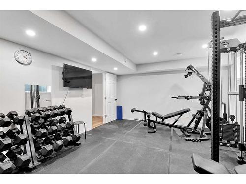 12 Rowley Terrace Nw, Calgary, AB - Indoor Photo Showing Gym Room