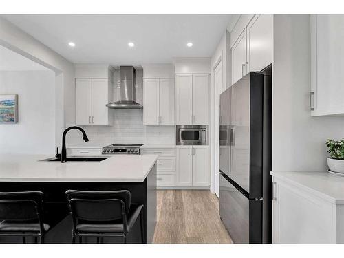 12 Rowley Terrace Nw, Calgary, AB - Indoor Photo Showing Kitchen With Upgraded Kitchen