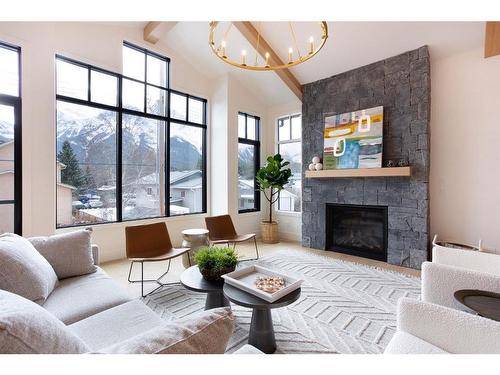 909B 9Th Street, Canmore, AB - Indoor Photo Showing Living Room With Fireplace