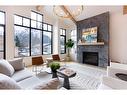 909B 9Th Street, Canmore, AB  - Indoor Photo Showing Living Room With Fireplace 