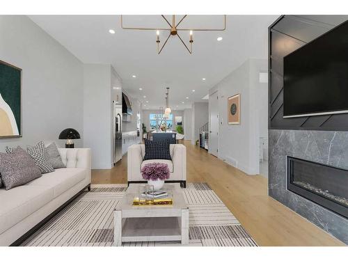 3537 40 Street Sw, Calgary, AB - Indoor Photo Showing Living Room With Fireplace