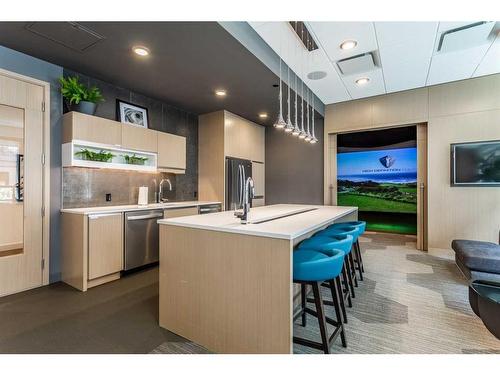 105-2231 Mahogany Boulevard Se, Calgary, AB - Indoor Photo Showing Kitchen With Stainless Steel Kitchen