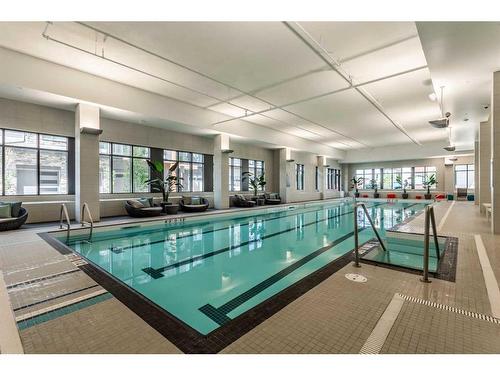 105-2231 Mahogany Boulevard Se, Calgary, AB - Indoor Photo Showing Other Room With In Ground Pool