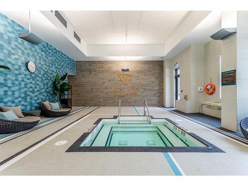 105-2231 Mahogany Boulevard Se, Calgary, AB - Indoor Photo Showing Other Room With In Ground Pool