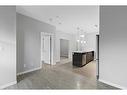 105-2231 Mahogany Boulevard Se, Calgary, AB  - Indoor Photo Showing Kitchen With Stainless Steel Kitchen With Upgraded Kitchen 