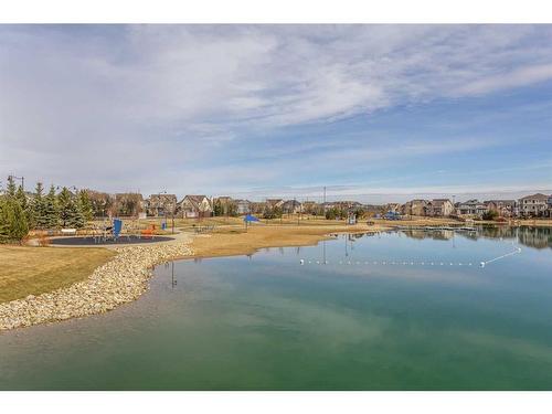 105-2231 Mahogany Boulevard Se, Calgary, AB - Outdoor With Body Of Water With View