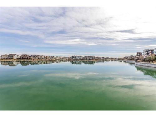 105-2231 Mahogany Boulevard Se, Calgary, AB - Outdoor With Body Of Water With View