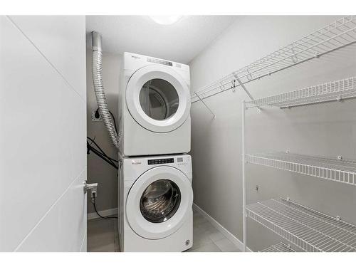 105-2231 Mahogany Boulevard Se, Calgary, AB - Indoor Photo Showing Laundry Room