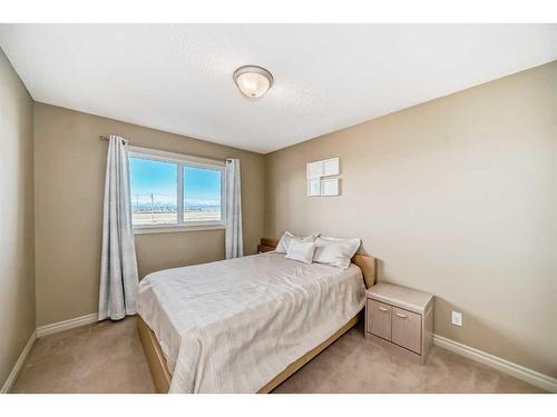 91 Arbour Meadows Close Nw, Calgary, AB - Indoor Photo Showing Bedroom