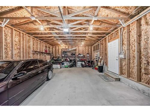 91 Arbour Meadows Close Nw, Calgary, AB - Indoor Photo Showing Garage