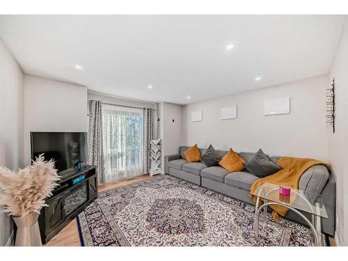 91 Arbour Meadows Close Nw, Calgary, AB - Indoor Photo Showing Living Room