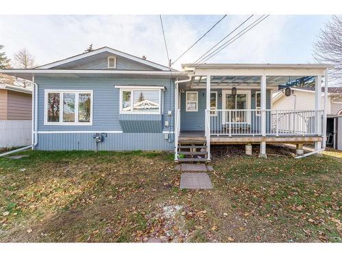 124 4 Avenue Nw, Airdrie, AB - Outdoor With Deck Patio Veranda