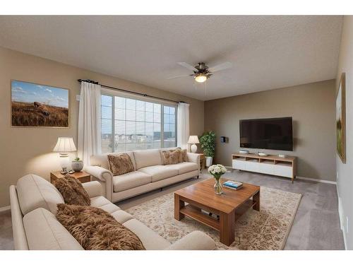 41 Eversyde Close Sw, Calgary, AB - Indoor Photo Showing Living Room