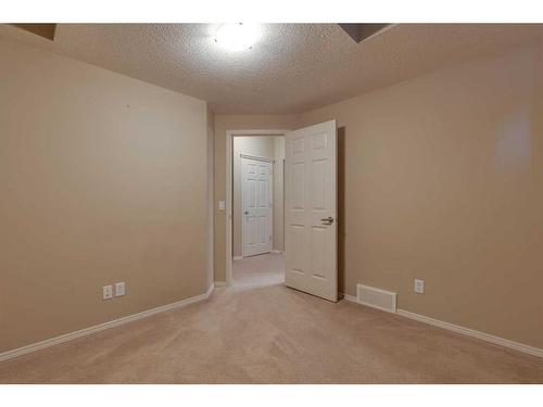 41 Eversyde Close Sw, Calgary, AB - Indoor Photo Showing Other Room