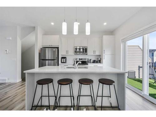 538 Canals Crossing Sw, Airdrie, AB - Indoor Photo Showing Kitchen With Stainless Steel Kitchen With Upgraded Kitchen