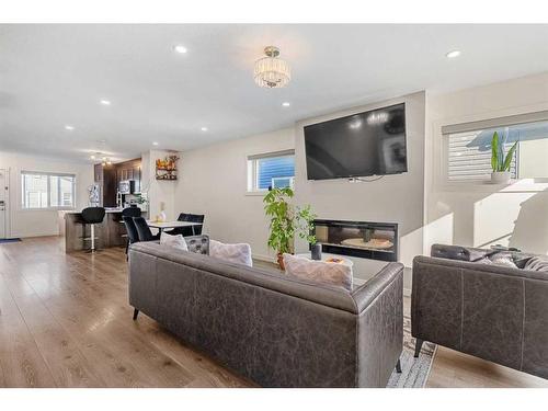 222 Red Embers Way Ne, Calgary, AB - Indoor Photo Showing Living Room With Fireplace