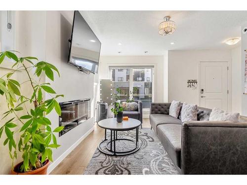 222 Red Embers Way Ne, Calgary, AB - Indoor Photo Showing Living Room With Fireplace