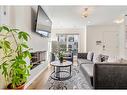 222 Red Embers Way Ne, Calgary, AB  - Indoor Photo Showing Living Room With Fireplace 