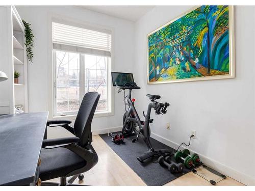 323-1800 14A Street Sw, Calgary, AB - Indoor Photo Showing Gym Room