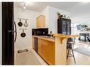 323-1800 14A Street Sw, Calgary, AB  - Indoor Photo Showing Kitchen With Double Sink 