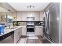 1152 140 Avenue Nw, Calgary, AB  - Indoor Photo Showing Kitchen With Double Sink 