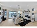 188 Crimson Ridge Place Nw, Calgary, AB  - Indoor Photo Showing Living Room With Fireplace 