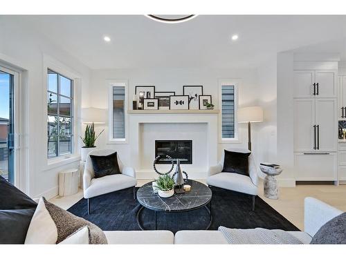 188 Crimson Ridge Place Nw, Calgary, AB - Indoor Photo Showing Living Room With Fireplace