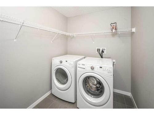 302-6603 New Brighton Avenue Se, Calgary, AB - Indoor Photo Showing Laundry Room