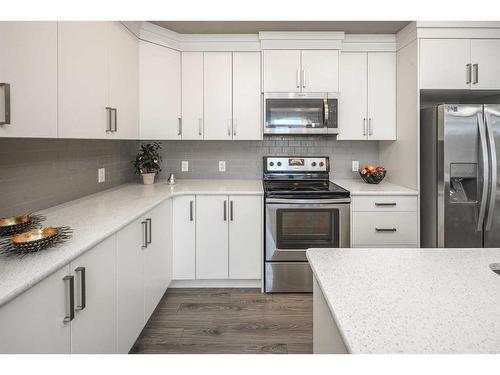 302-6603 New Brighton Avenue Se, Calgary, AB - Indoor Photo Showing Kitchen With Upgraded Kitchen