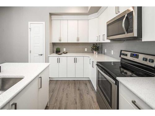 302-6603 New Brighton Avenue Se, Calgary, AB - Indoor Photo Showing Kitchen