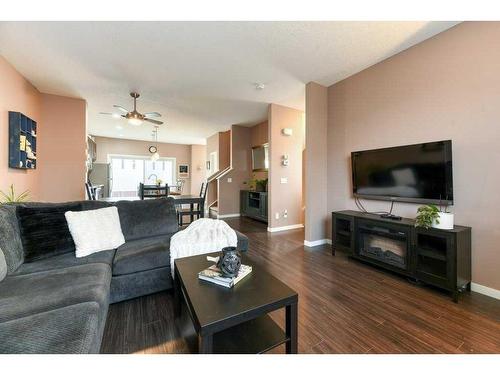 140 Copperpond Villas Se, Calgary, AB - Indoor Photo Showing Living Room