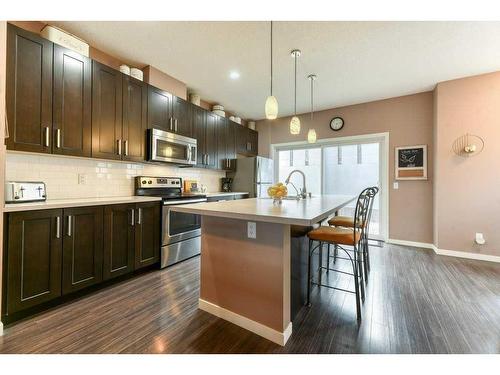 140 Copperpond Villas Se, Calgary, AB - Indoor Photo Showing Kitchen With Stainless Steel Kitchen With Upgraded Kitchen