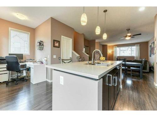 140 Copperpond Villas Se, Calgary, AB - Indoor Photo Showing Kitchen With Double Sink